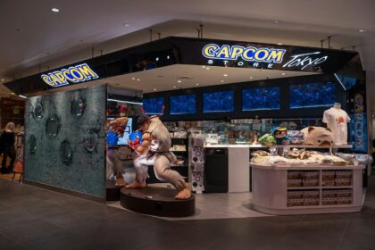 a store with a statue of a man holding a baby